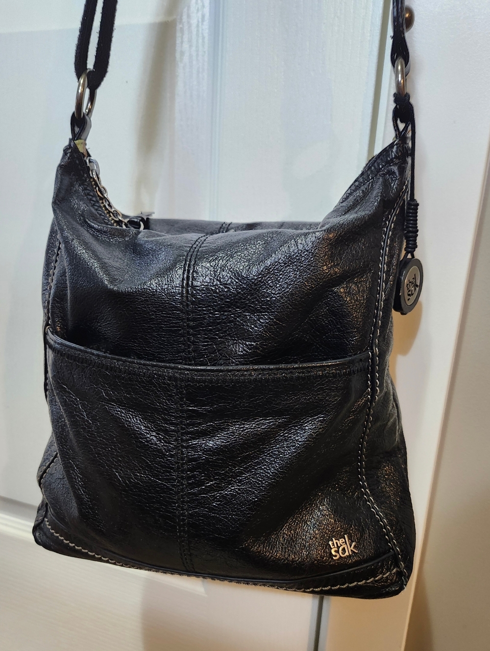 Great Condition, The Sak "Iris" Black Leather Crossbody Purse.